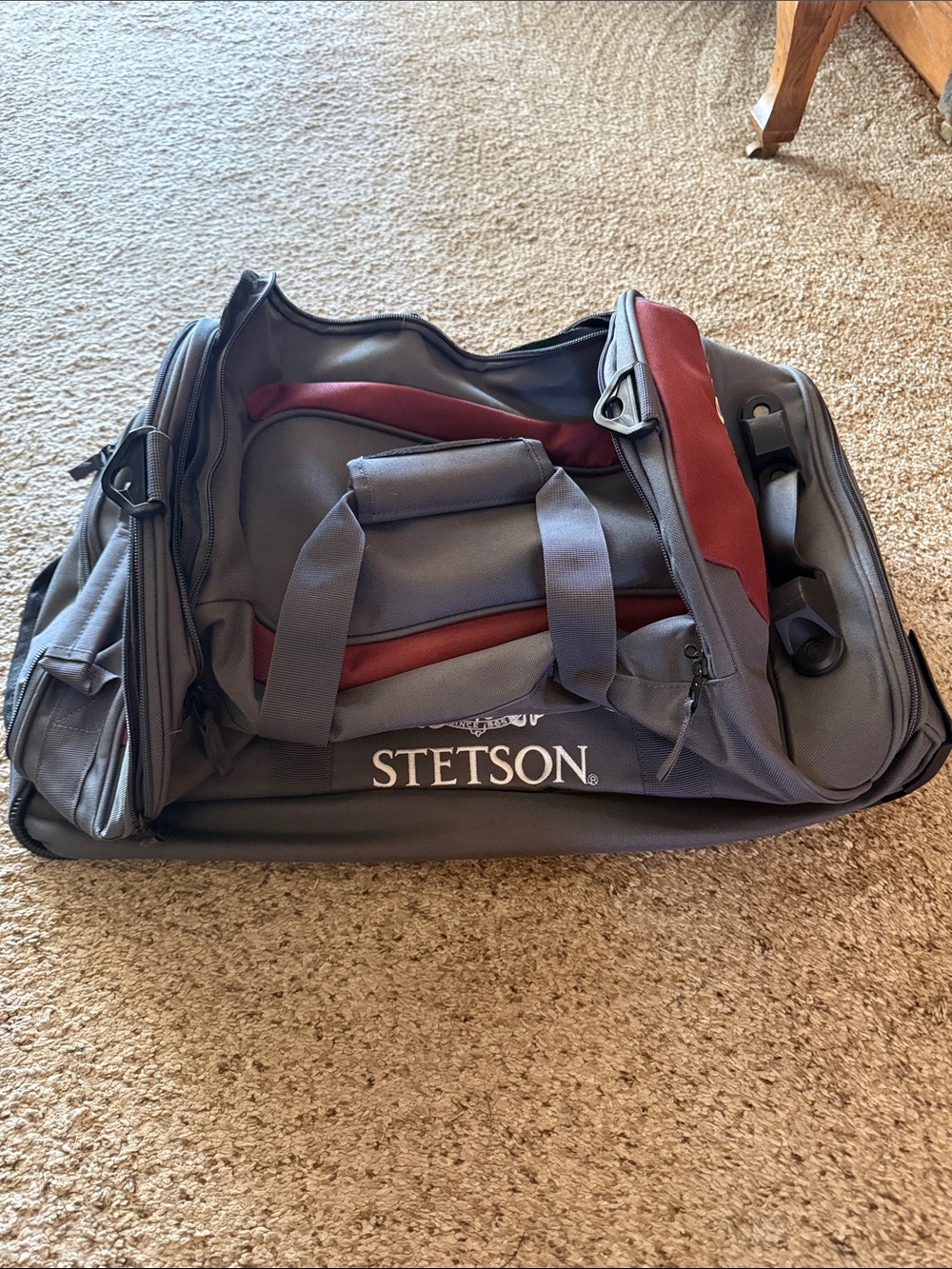 Stetson Rolling Duffel Bag in Gray & Red